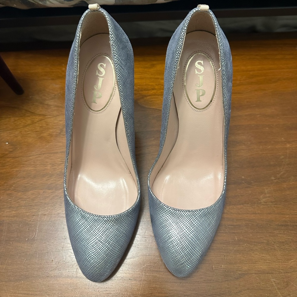 SJP Silver Pumps